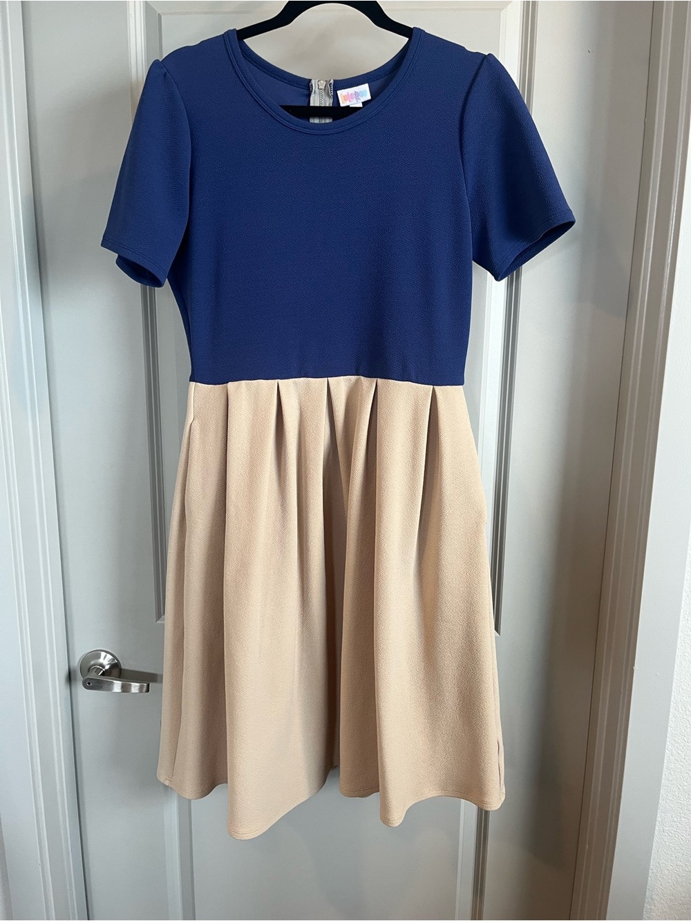 LuLaRoe Navy knit top and Cream skirt with Pockets